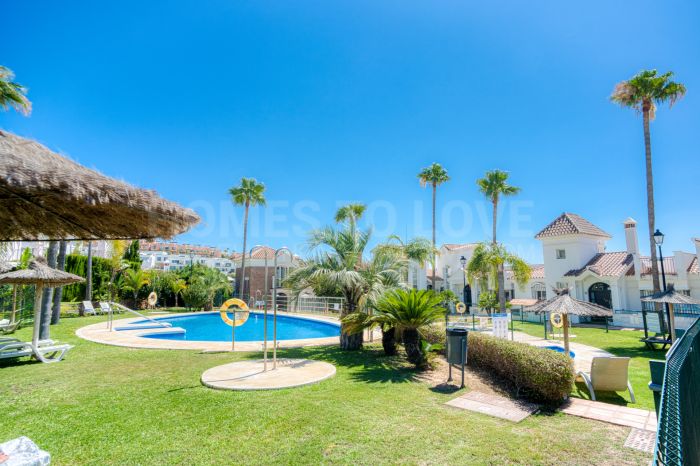 Stylish south east facing, three-bedroom semi detached townhouse located in Riviera del Sol