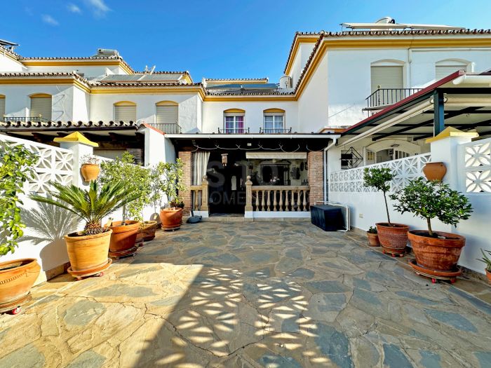 Charming Townhouse with Large Terrace and Private Garage in the Center of Estepona