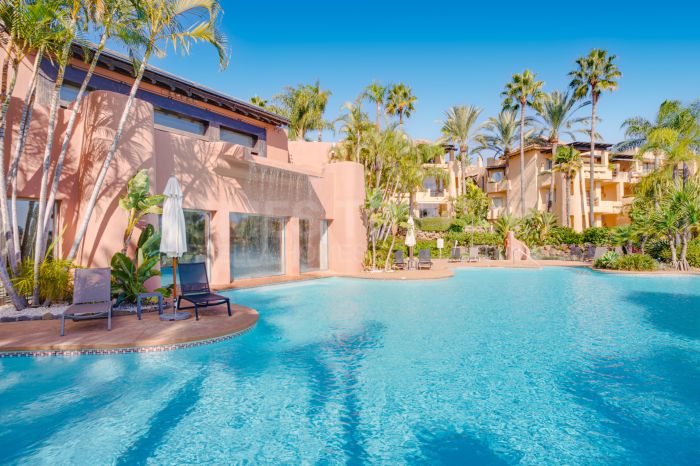 Beautiful, two bedroom, south facing ground floor apartment in the prestigious Mansion Club Marbella