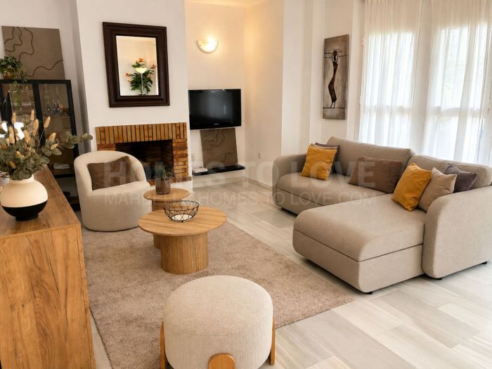 Encantador apartamento en planta baja en alquiler en Los Naranjos, Nueva Andalucía
